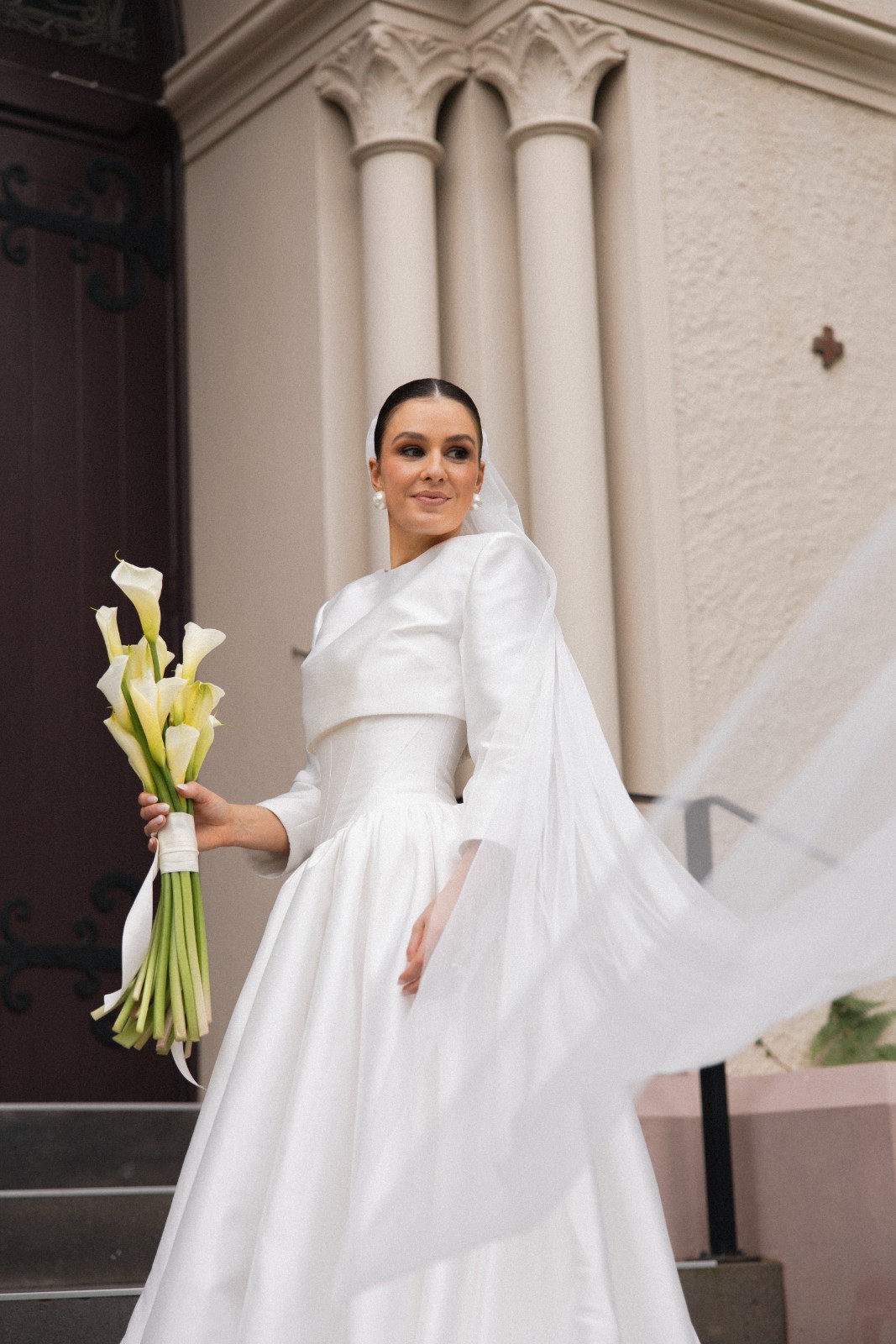 Bride at a sunlit window