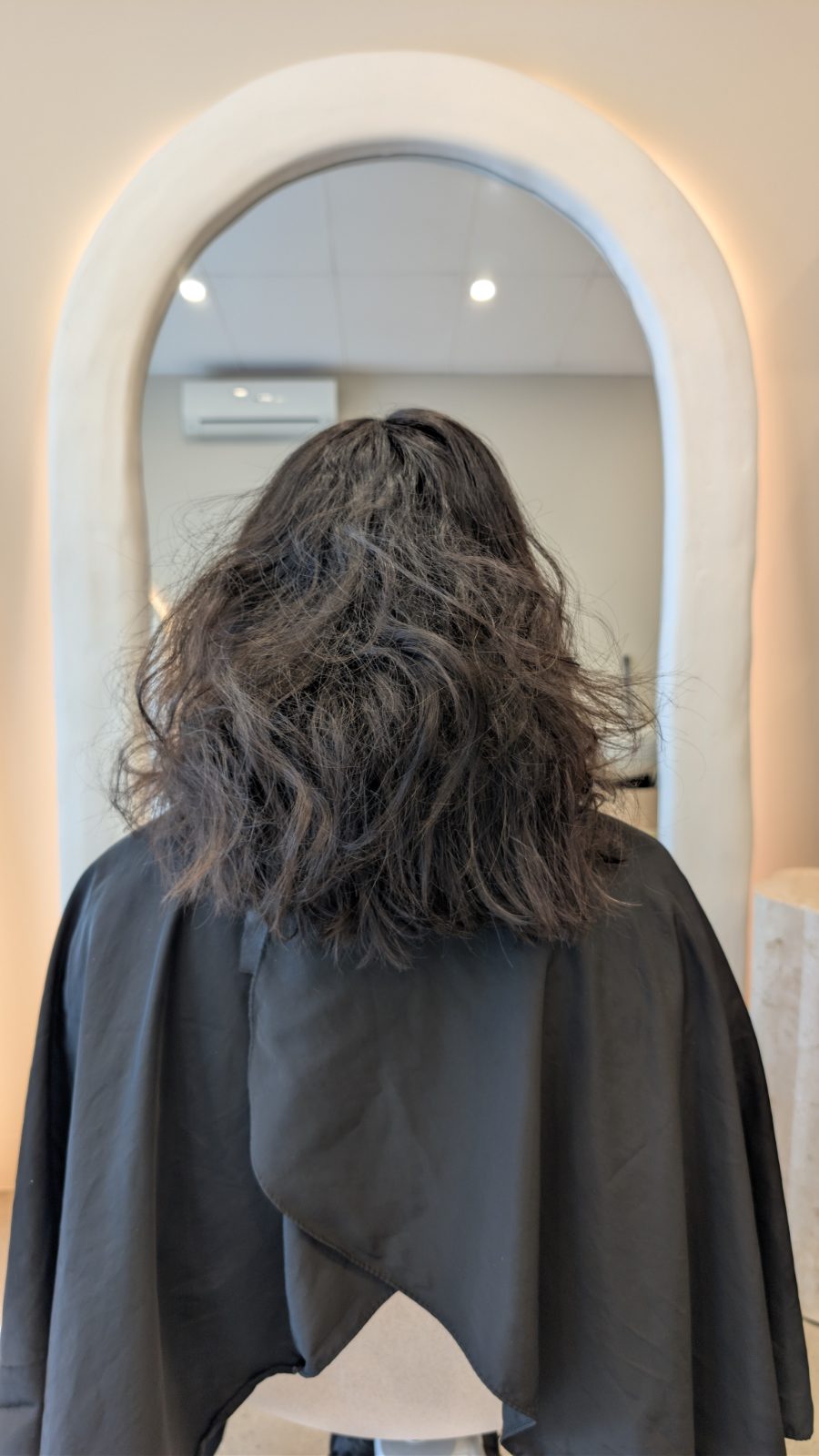 The same client ten months after her first nanoplasty, hair still smooth
